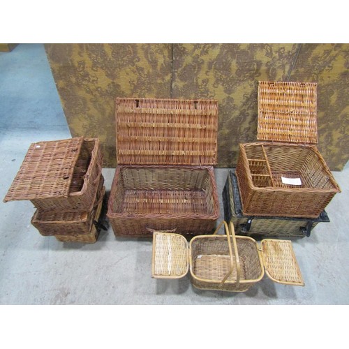 1068 - Seven contemporary wicker hampers of varying size and design