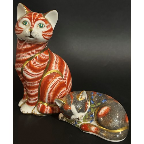 128 - Eleven ceramic animals to include Imari and other comprising seven cats, two crabs and a wren (11)