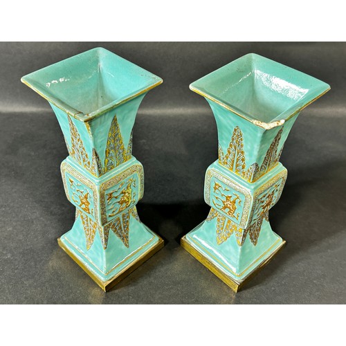 74 - A pair of late 19th/early 20th century European Gu shaped porcelain vases, in the Chinese style, wit... 