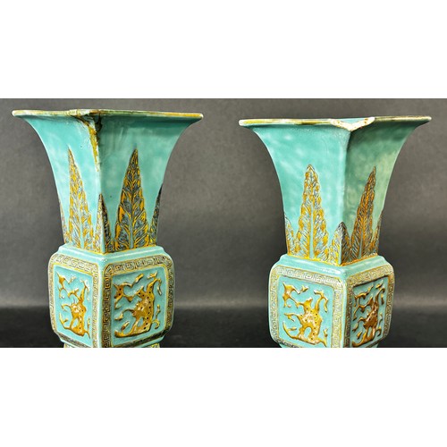 74 - A pair of late 19th/early 20th century European Gu shaped porcelain vases, in the Chinese style, wit... 