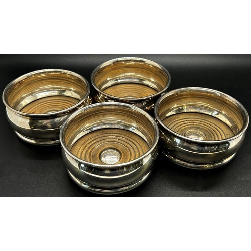 216 - A good selection of silver plate to include a set of six crown napkin rings set with blue cabochon s... 