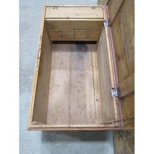 1090 - An antique stripped pine box with hinged boarded lid, 45 cm high x 99 cm wide x 53 cm deep