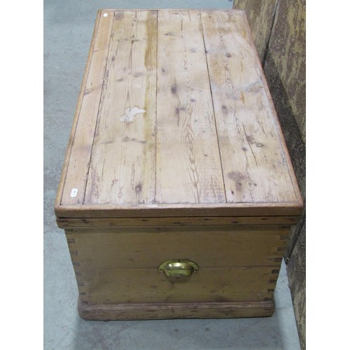 1090 - An antique stripped pine box with hinged boarded lid, 45 cm high x 99 cm wide x 53 cm deep