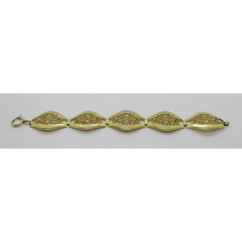Decorative yellow metal bracelet with floral openwork links, 20cm L approx, 21.8g