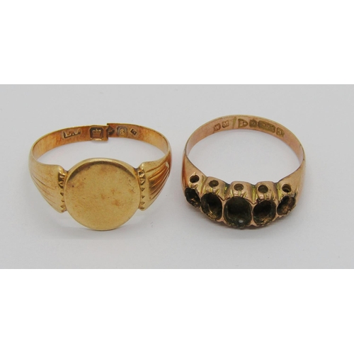 402 - Two Edwardian gold rings; an 18ct signet ring and a 9ct five stone ring (both af)