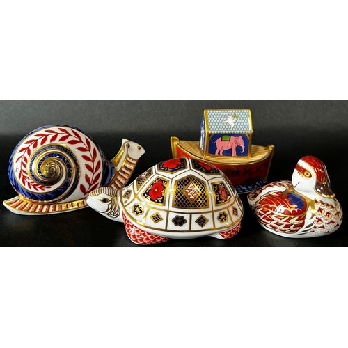 102 - Six Crown Derby figures in the Imari style; a duck, snail, tortoise, two birds and a Noah's Ark