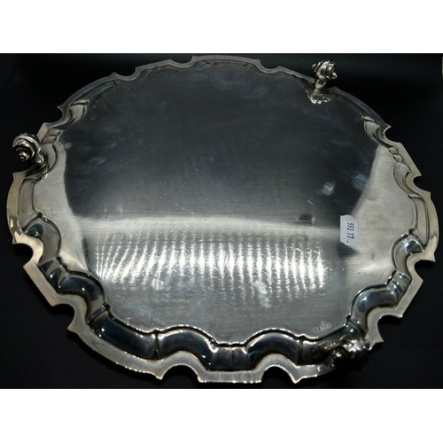 258 - A silver scalloped edge salver, raised on scrolled supports, 30cm diam, Sheffield 1922 maker William... 