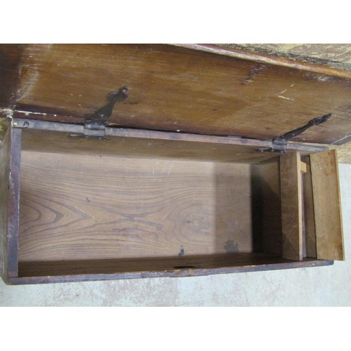 1135 - A simple antique elm countrymade boarded coffer with hinged lid, steel lock plate and bracket shaped... 