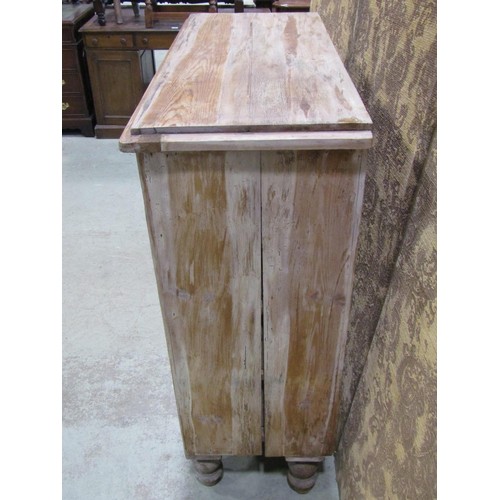 1136 - A Victorian stripped Pine bedroom chest of two short over three long graduated drawers with shaped a... 