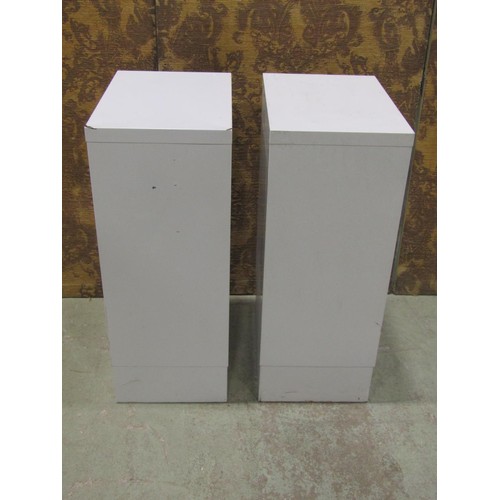 1137 - Two contemporary painted light steel floor standing filing cabinets each fitted with a tower of ten ... 