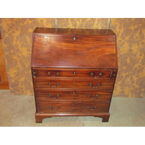 1129 - A Georgian mahogany bureau of four long drawers with fitted interior, 92 x 51cm, 109cm high.