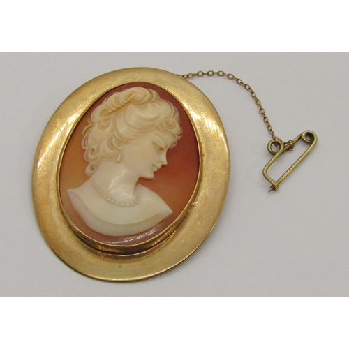 348 - Vintage 9ct cameo brooch depicting a lady in profile, brooch 6 x 4.9cm approx, 25.6g