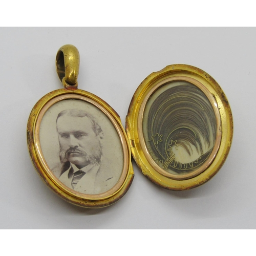 355 - Victorian 15ct locket containing a photograph of a gentleman and a lock of hair with gold thread dec... 