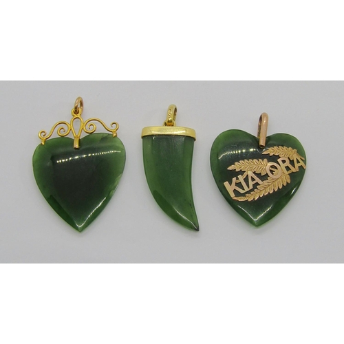 358 - Three antique 9ct carved New Zealand nephrite pendants to include a heart shaped 'Kia Ora' example, ... 