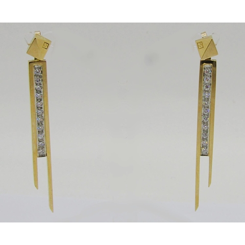 363 - Pair of stylised contemporary 18ct asymmetrical drop earrings set with a line of diamonds, 5.4cm L a... 