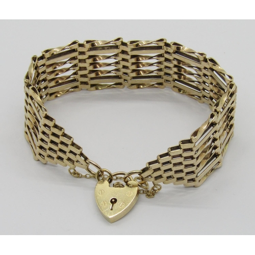 368 - Vintage 9ct twisted gate link bracelet with heart padlock clasp, 27.3g