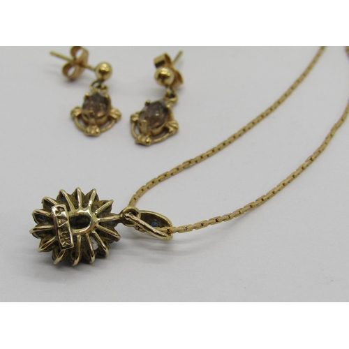 372 - Group of gold jewellery comprising a 14k cluster pendant set with a cabochon black star sapphire and... 