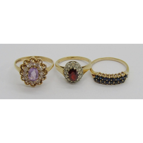 373 - Three vintage 9ct gem set dress rings to include an amethyst example, 8.2g total (3)