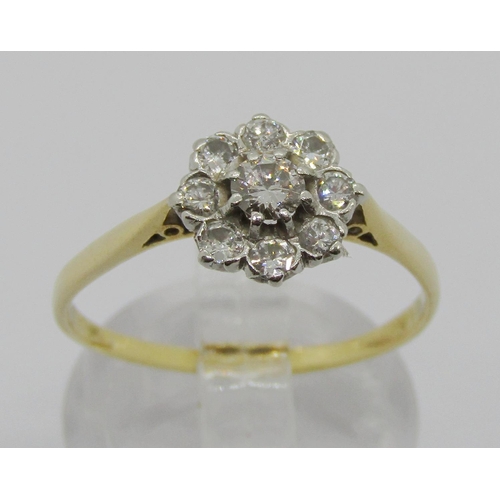 376 - Yellow metal diamond cluster ring, centre stone 0.20ct approx, size P/Q, 2.1g