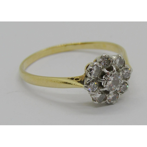 376 - Yellow metal diamond cluster ring, centre stone 0.20ct approx, size P/Q, 2.1g