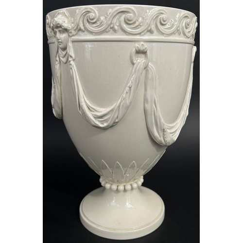 127 - A Wedgwood 19th century creamware goblet shaped vase with mask and scrolling detail