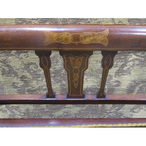 1215 - An inlaid Edwardian mahogany piano stool with hinged upholstered box seat beneath a shaped and mould... 