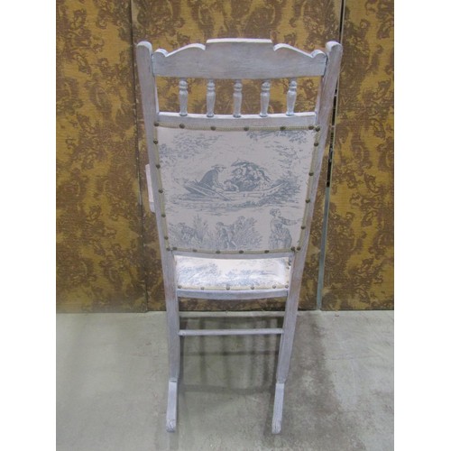 1113 - Edwardian rocking chair with carved cresting rail, later upholstered pad seat and back raised on tur... 