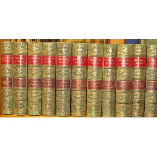 819 - Collection of works by Charles Dickens (13 volumes) (1850) red & green leather bindings