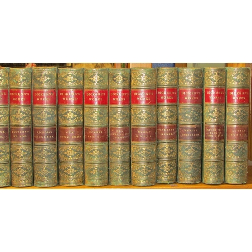 819 - Collection of works by Charles Dickens (13 volumes) (1850) red & green leather bindings