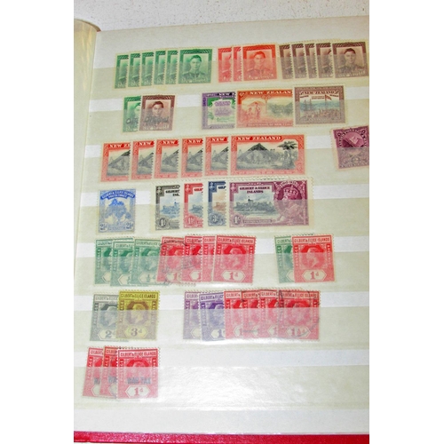 871 - A small red stockbook containing an eclectic mix of stamps, some identified with SG numbers and cat ... 