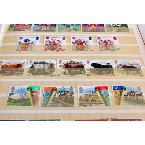 872 - A Great Britain collection housed in 2 stock books and SG printed album. QV-QE11 Large quantity of Q... 