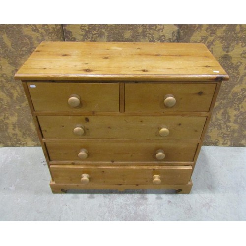 1227 - A stripped pine bedroom chest of two short over three long drawers on bracket supports, 93 cm high x... 