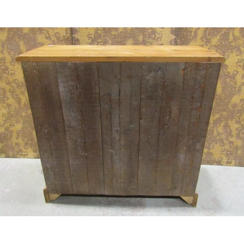 1227 - A stripped pine bedroom chest of two short over three long drawers on bracket supports, 93 cm high x... 