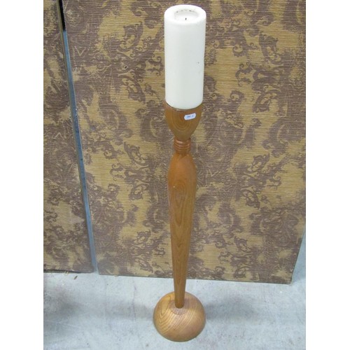 1232 - A contemporary beechwood torchere with spiral twist column 99 cm high together with a pair of furthe... 