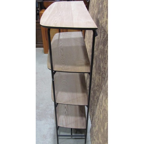 1233 - A contemporary retro style tubular steel framed floorstanding four tier open ashwood veneered shelvi... 