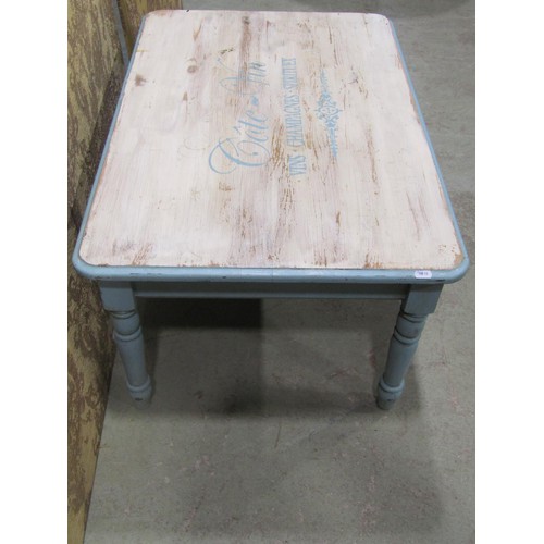 1248 - A low partially painted pine occasional table of rectangular form with moulded outline raised on tur... 