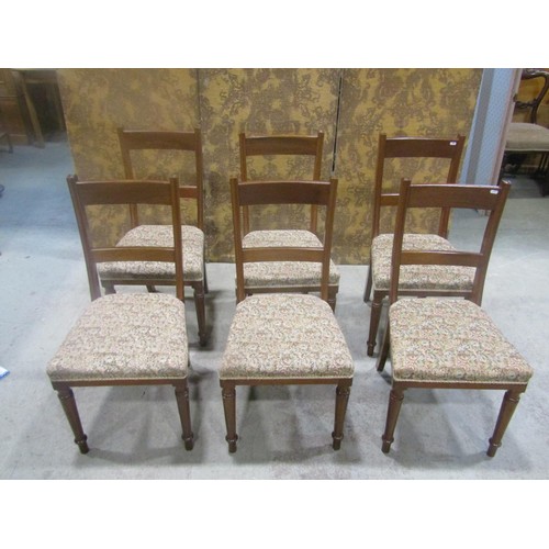 1254 - Set of six mahogany bar back dining chairs by Maple & Co with upholstered seats raised on ring turne... 