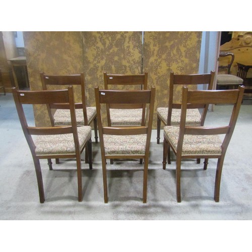 1254 - Set of six mahogany bar back dining chairs by Maple & Co with upholstered seats raised on ring turne... 