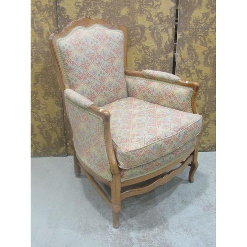 1259 - A drawing room chair with upholstered seat, back and arm pads within a  beech wood show wood frame r... 