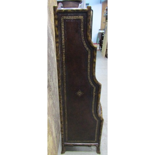 1262 - A Regency style simulated bamboo waterfall bookcase with leather panelled and overlaid sides and gra... 