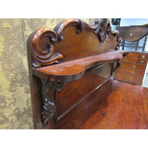 1264 - A Victorian mahogany chiffonier, the base enclosed by a pair of arched moulded panelled doors beneat... 