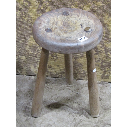 1220 - Rustic elm milking stool on turned supports, together with a small oak drop leaf table in the Old En... 