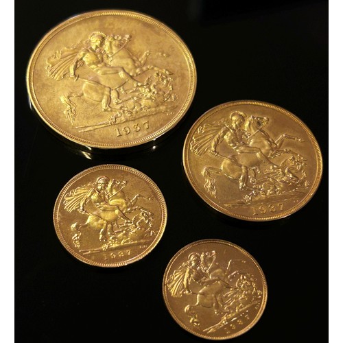 487 - A George VI 1937 cased specimen coin set, compromising £5, £2, sovereign and half sovereign.