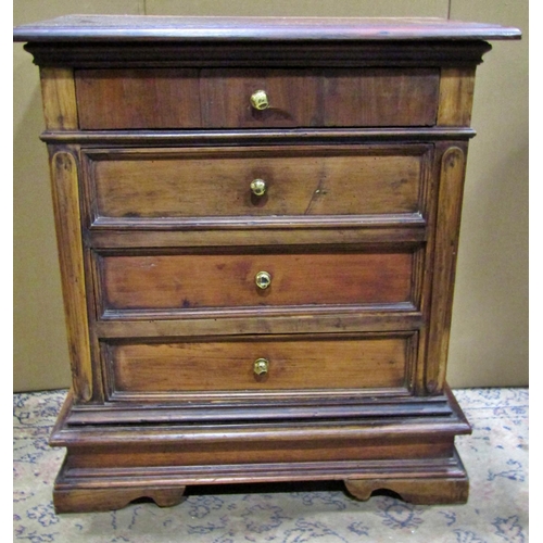 1285 - A small bedside chest of four drawers, composed from earlier reclaimed timbers, fitted throughout wi... 