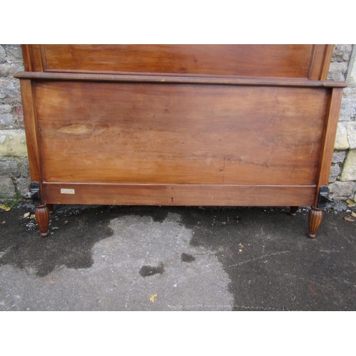 1295 - Early 20th century mahogany double bed frame in carved wood with floral decoration, to accept a 4'6