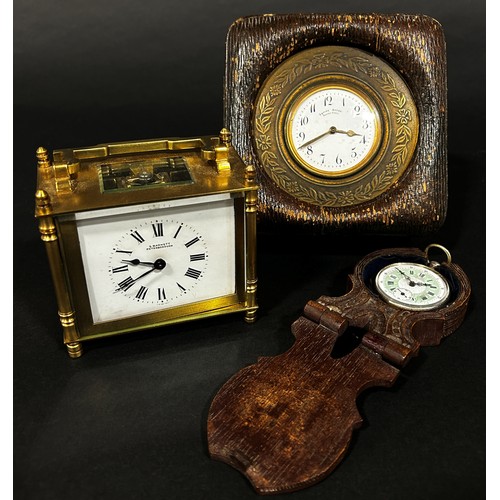 517 - Early 20th century travelling clock in engraved circular case and Morocco leather case, with enamell... 