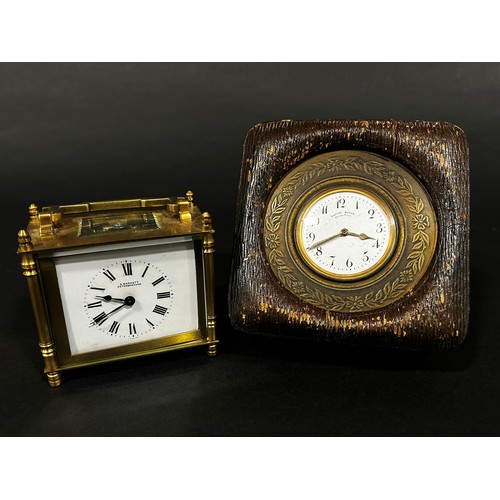 517 - Early 20th century travelling clock in engraved circular case and Morocco leather case, with enamell... 