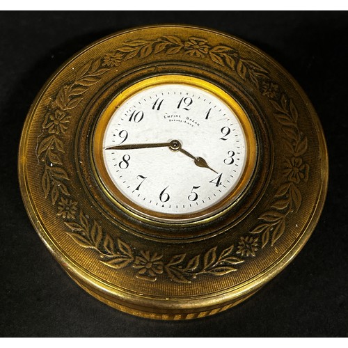 517 - Early 20th century travelling clock in engraved circular case and Morocco leather case, with enamell... 