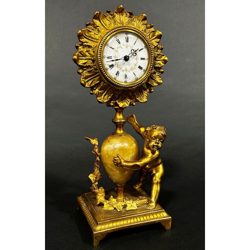 518 - 19th century gilt mantle clock the painted dial within a flower head border, surmounted on an onyx s... 