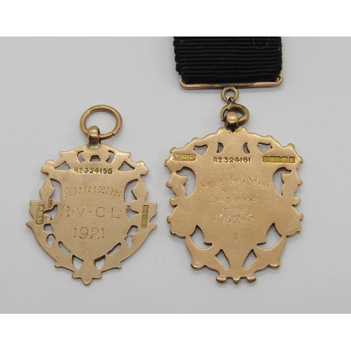 311 - Edwardian 9ct mounted ribbon fob with medal inscribed 'Edwin Bibby for General Excellence', 14.5g gr... 